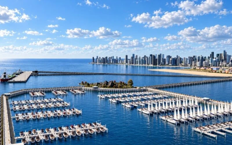 Yachts berthed at a marina, illustrating the Mumbai Marina project at Victoria Dock