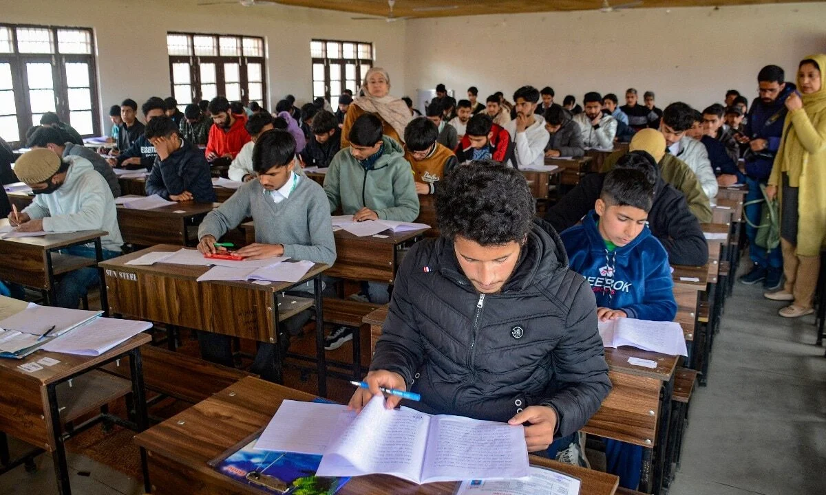 Students and the ICAI emblem related to CA examinations
