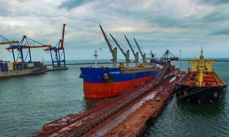 Cargo ships and port cranes at an Essar Ports terminal