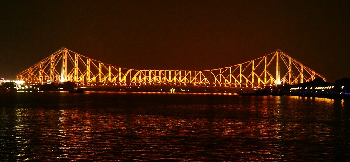Howrah Bridge over the Hooghly river in Kolkata at night