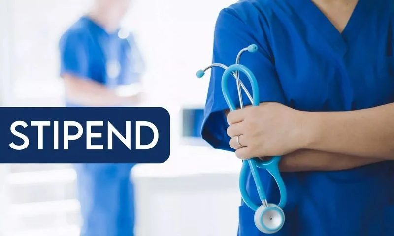 Medical interns in white coats at a government hospital in Jammu and Kashmir