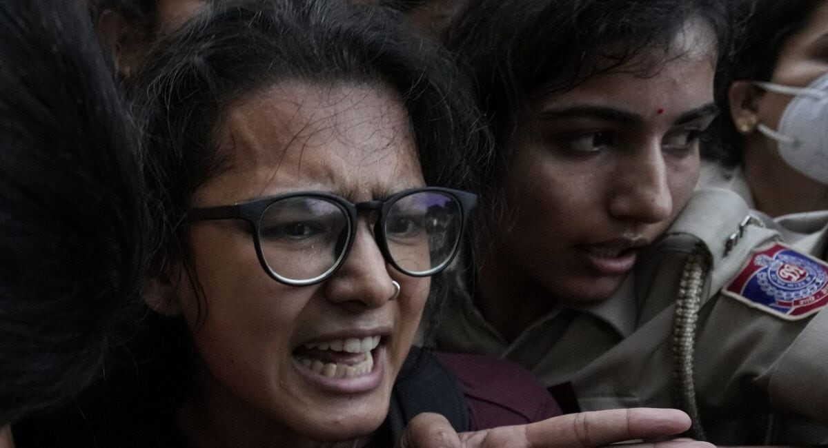 Police detain AISA president Neha Bora during a protest at Mandi House, New Delhi