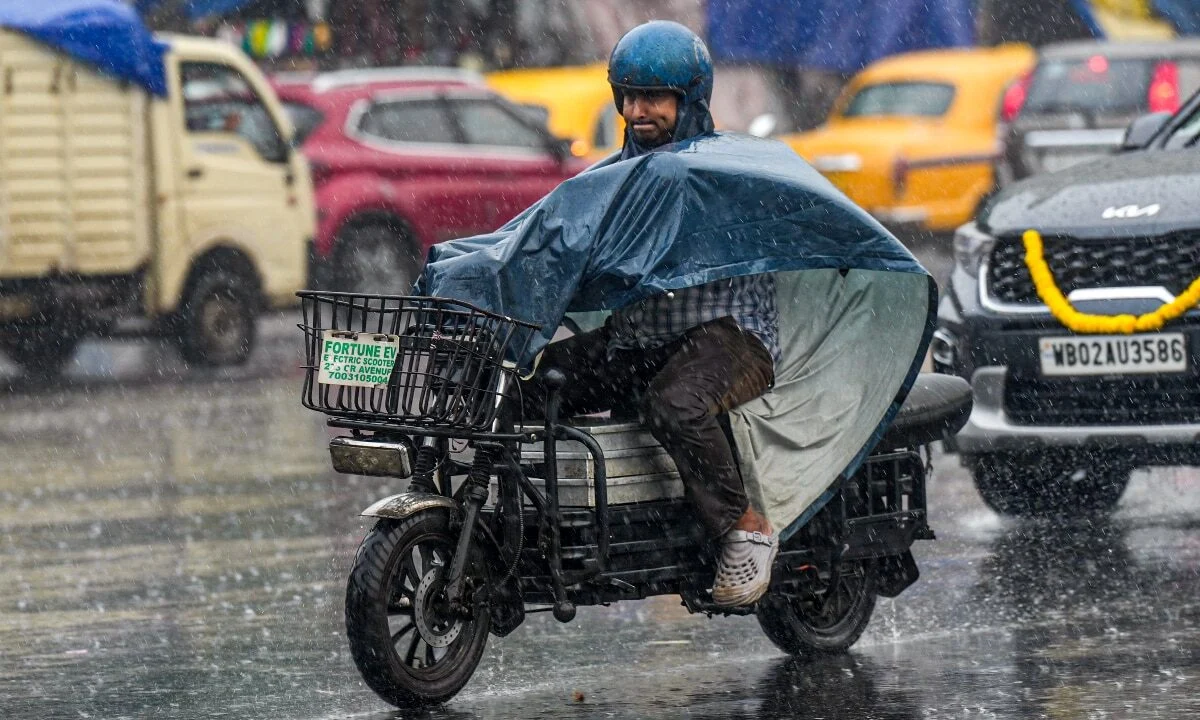 Heavy rain falling on a city street