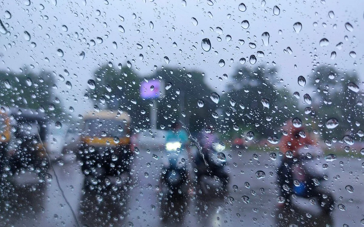 Rain falling on a city street during heavy showers in southern India